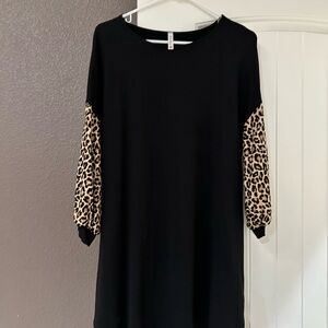 Black Dress with Leopard Print Sleeves